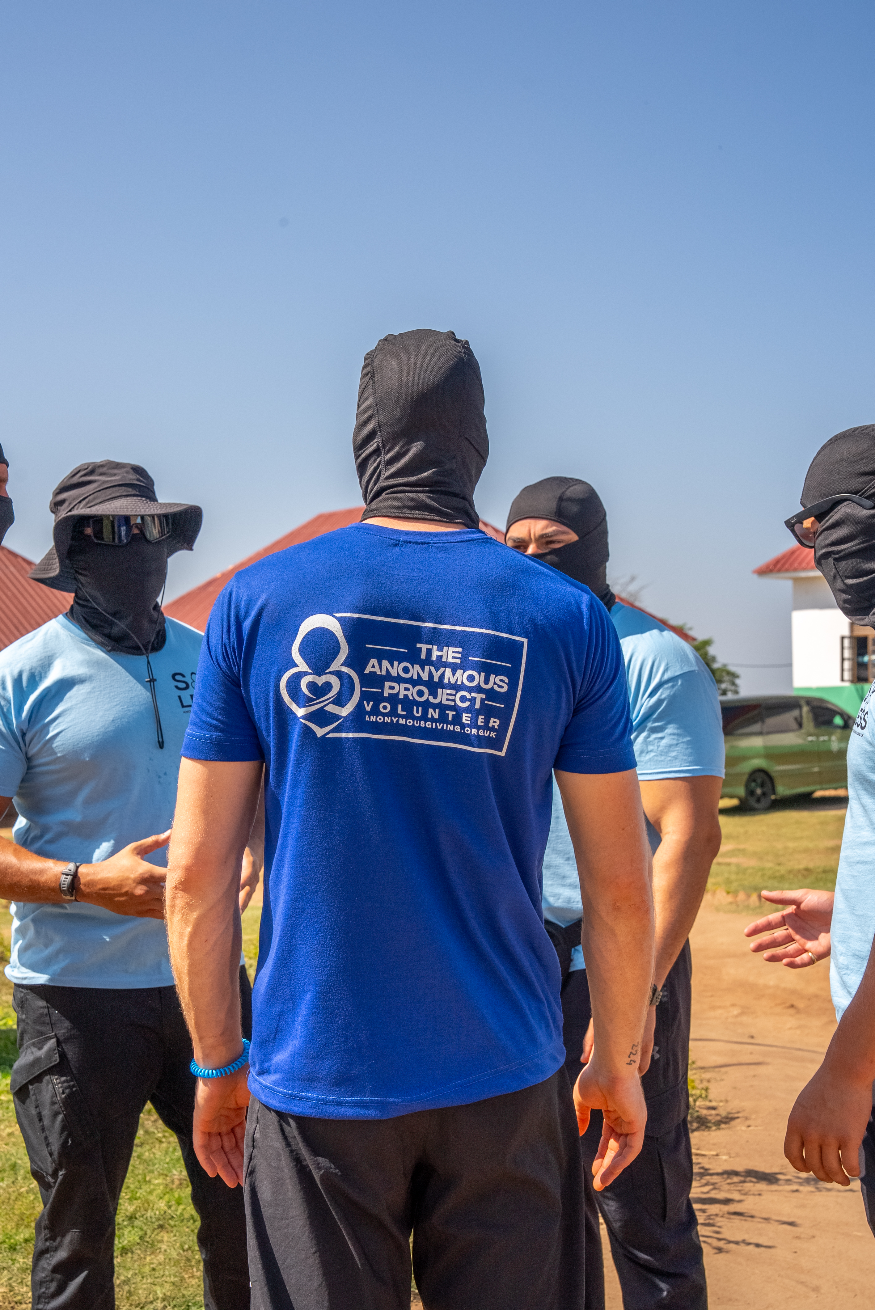Masked volunteers planning aid delivery